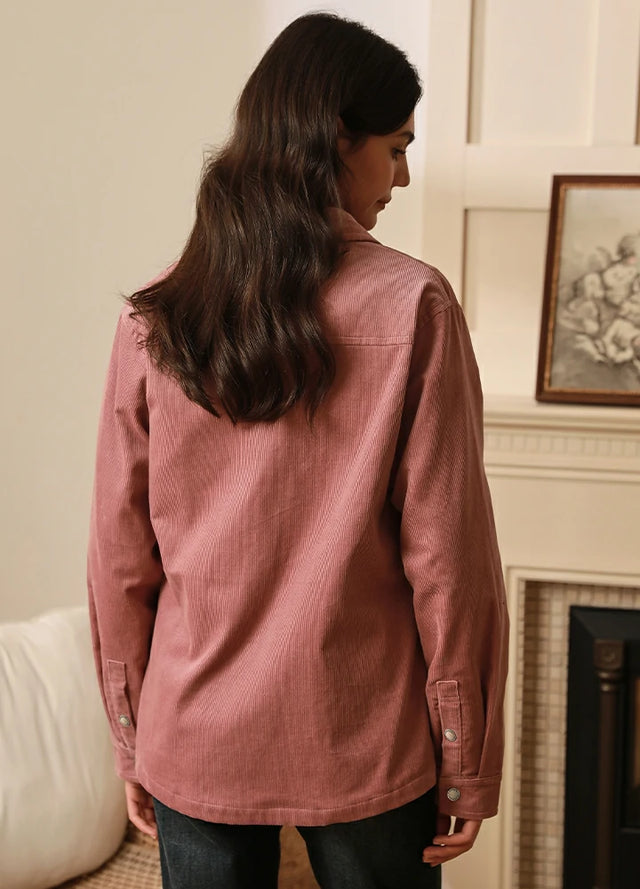 Back view of a woman in a pink flannel-lined corduroy shacket