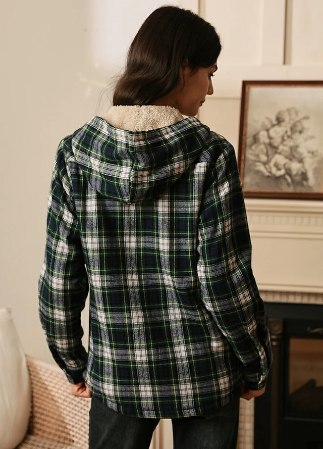 Back view of women in a warm plaid green plaid hooded