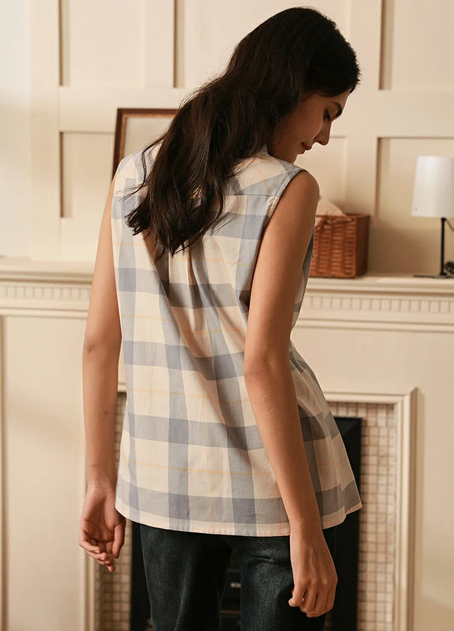 Back view of women's gray and white summer cotton plaid vest