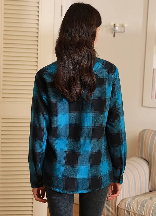 Back view of Women in a blue black long-sleeves flannel jacket with sherpa-lined