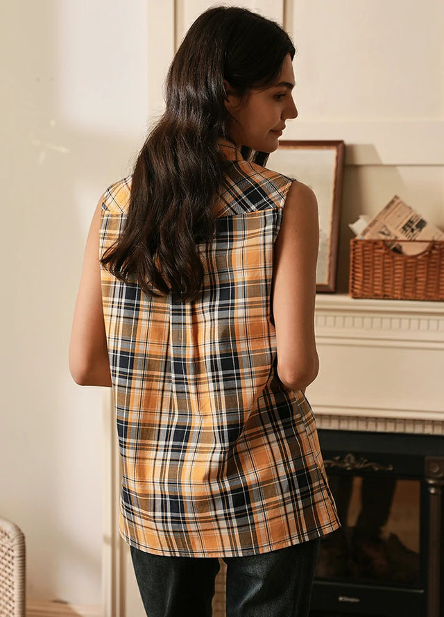 Back view of women's black and yellow cotton plaid flannel vest