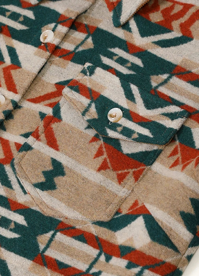 Close-up of the front pocket on a women's khaki wool blend shacket