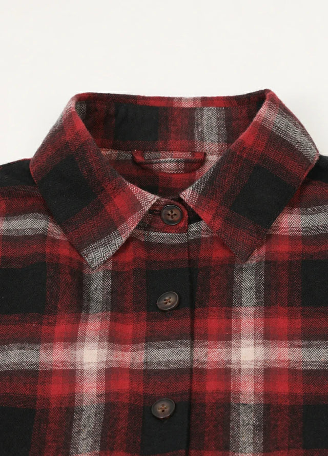 Close-up of the women's burgundy cozy flannel plaid shirt collar