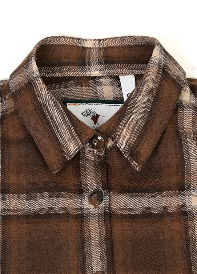Close-up of the women's brown cozy durable flannel plaid shirt collar