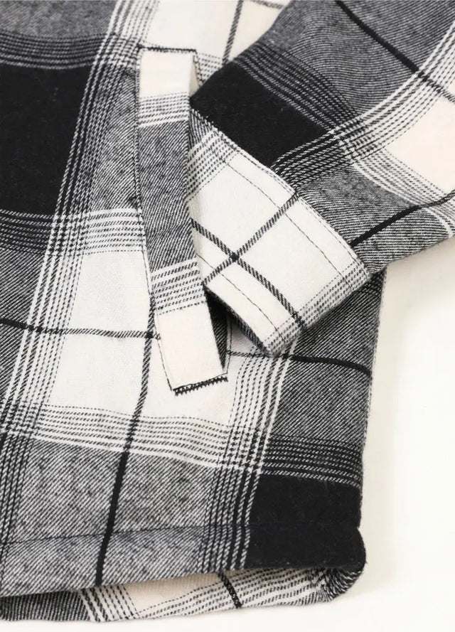 Close-up of women's white black plaid sherpa-lined flannel hooded hand pocket
