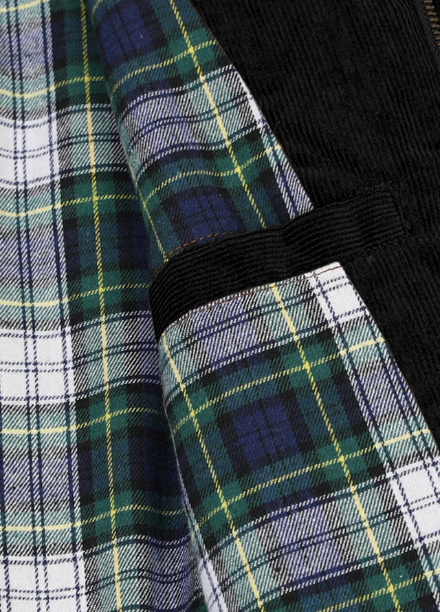 Close-up of women's black flannel-lined corduroy jacket inner pocket