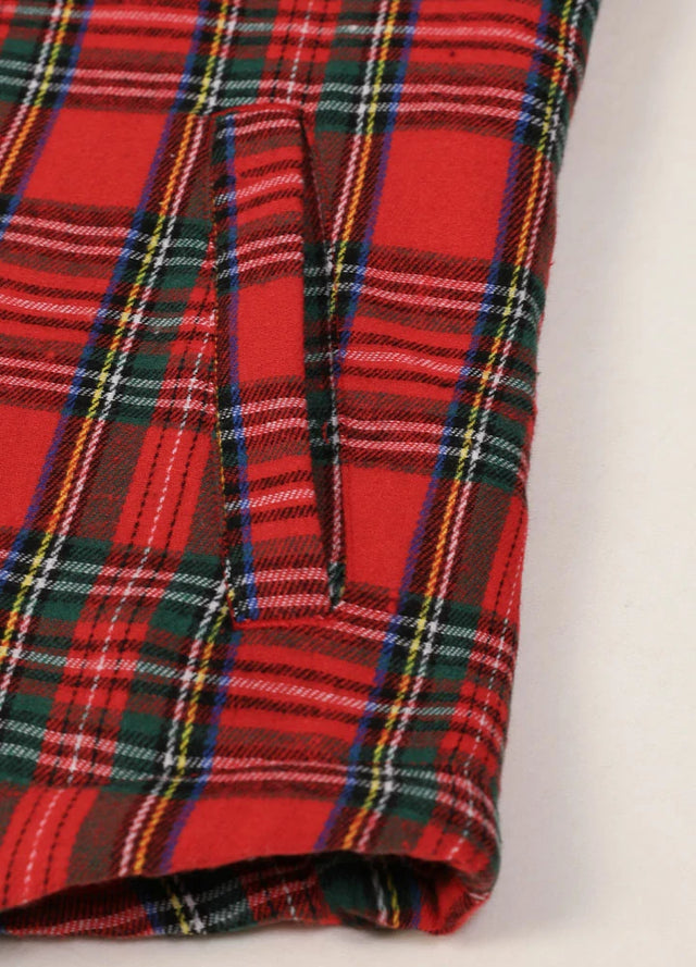 Close-up of women's red plaid sherpa lined shirt jacket hand pocket