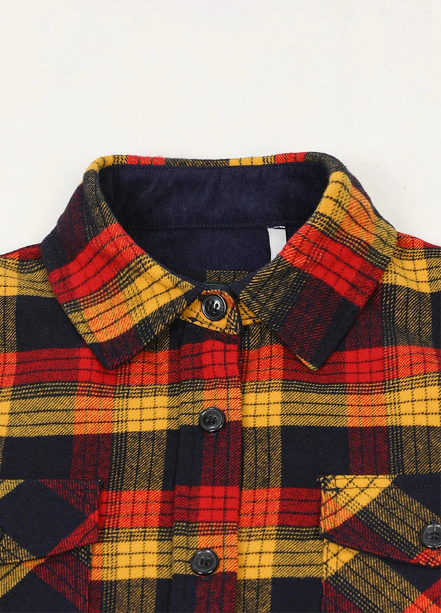 Close-up of women's corduroy trim red black plaid flannel shirt collar
