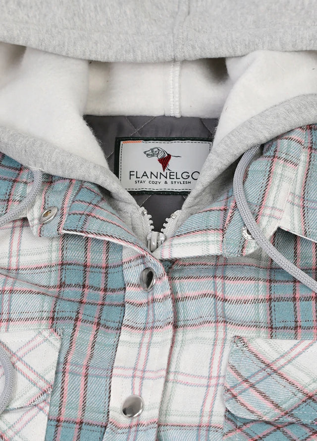 Close-up of women's white and blue quilted-lined plaid flannel jacket collar