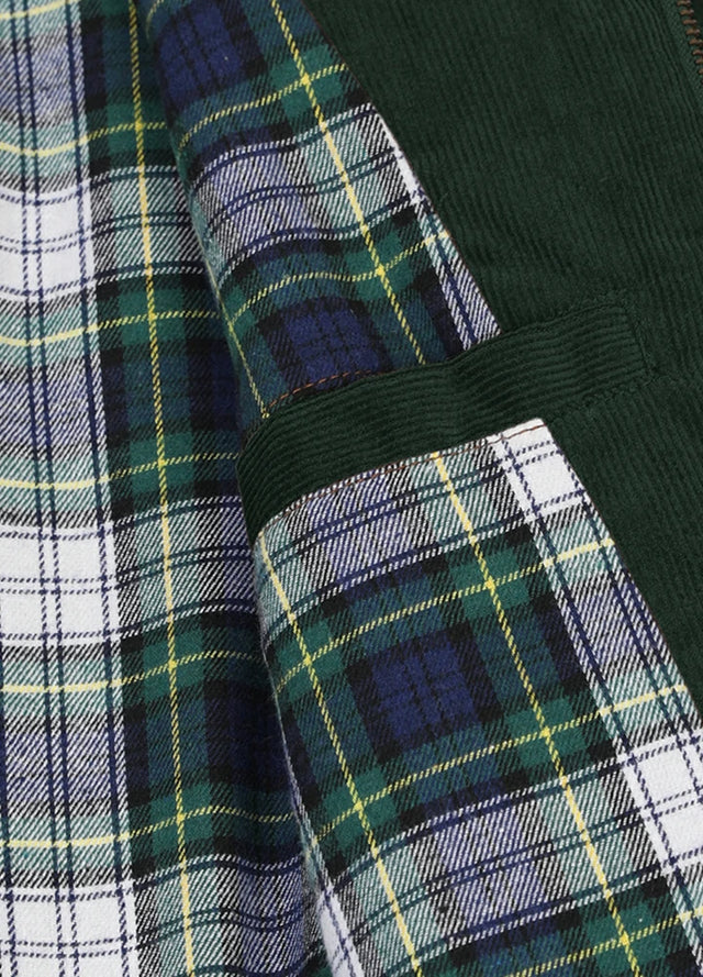 Close-up of women's dark green flannel-lined corduroy jacket inner pocket