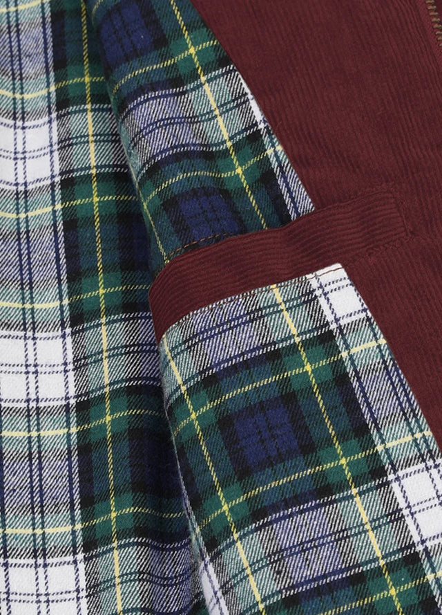 Close-up of women's burgundy flannel-lined corduroy jacket inner pocket
