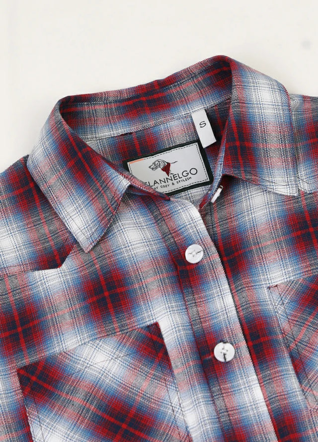 Close-up of womens chest pocket pearl snap red white plaid vest collar
