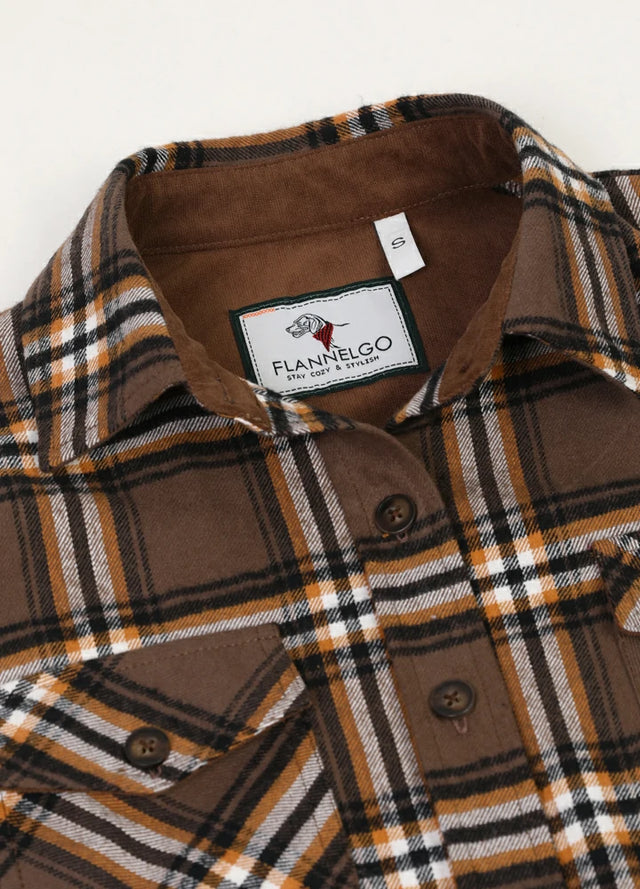 Close-up of womens corduroy trim chocolate plaid flannel shirt collar