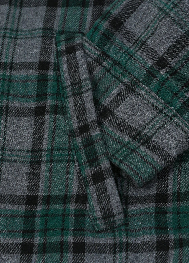 Close-up of womens snap green grey plaid flannel hooded hand pocket