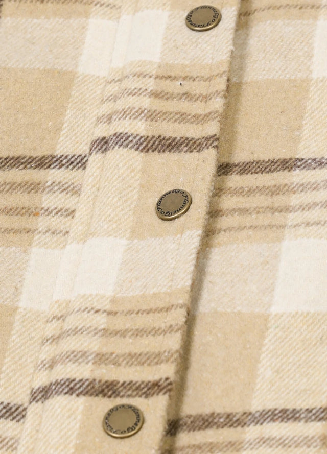 Detailed view of women's light khaki winter sleeveless plaid vest snap