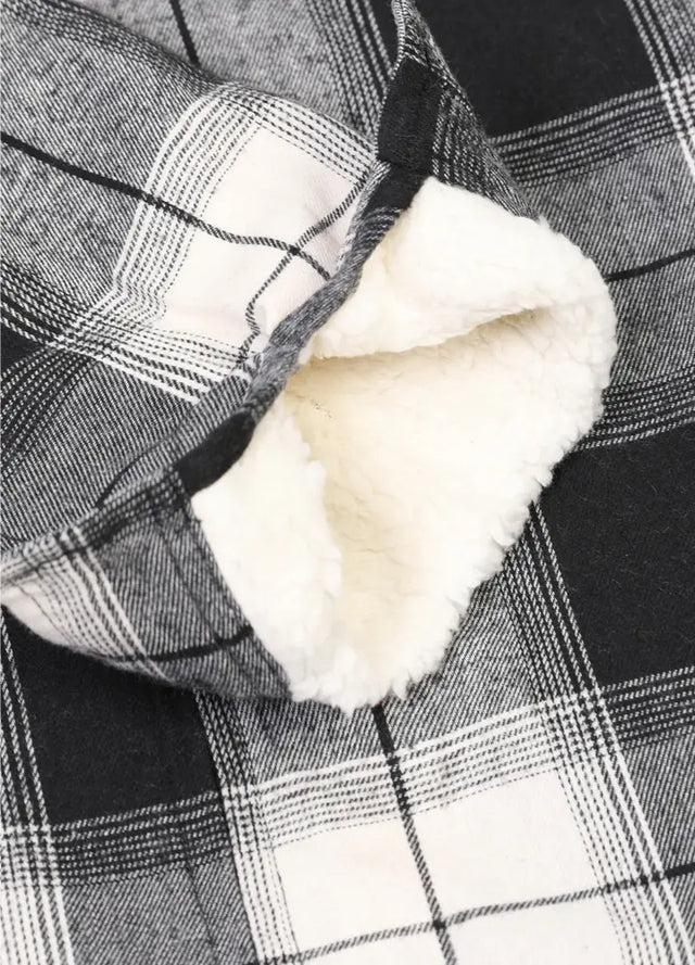 Detailed view of womens white black plaid flannel hooded jacket cuffs