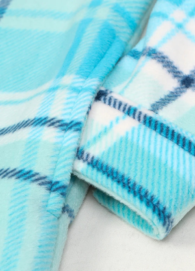 Detailed view of womens blue button down plaid shacket hand pocket