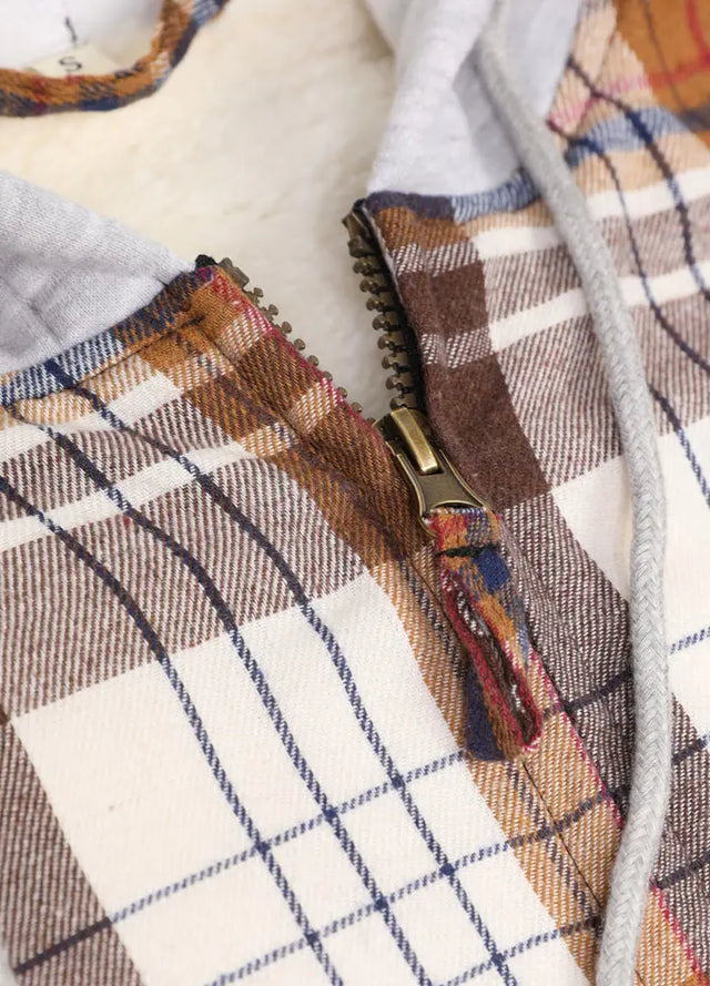 Detailed view of womens khaki full zip up winter plaid jacket hooded zip