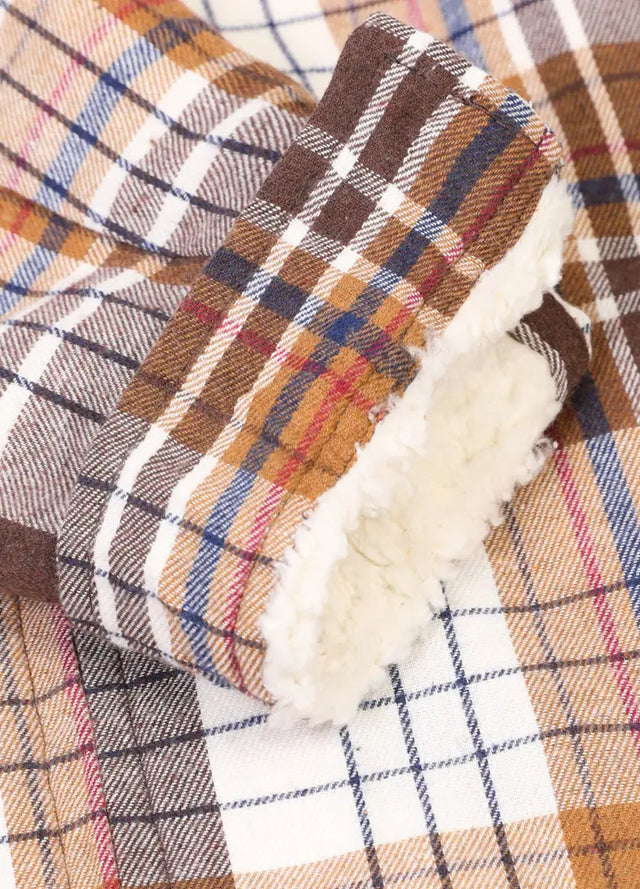 Detailed view of women's khaki sherpa lined flannel hooded jacket cuffs