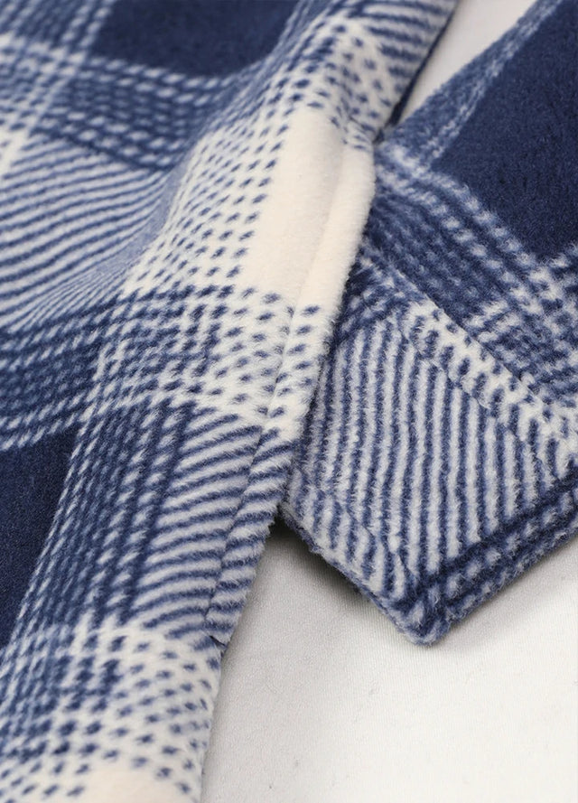 Detailed view of womens blue black plaid shirt jacket hand pocket