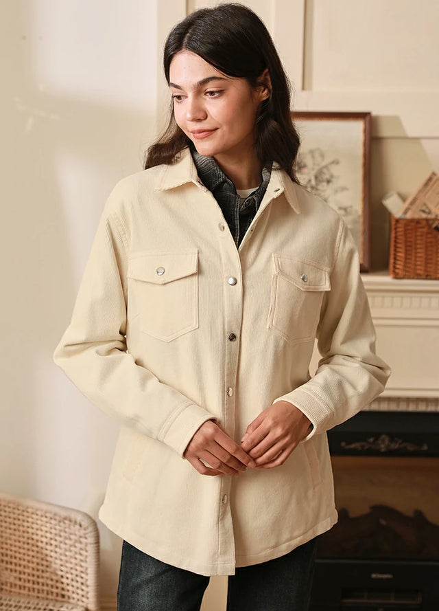Front view of a woman in a cream corduroy shacket