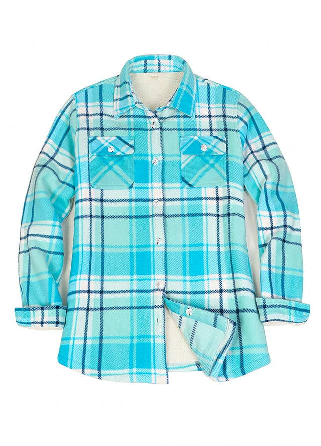 Front view of a women's blue button up plaid shacket with sherpa lined
