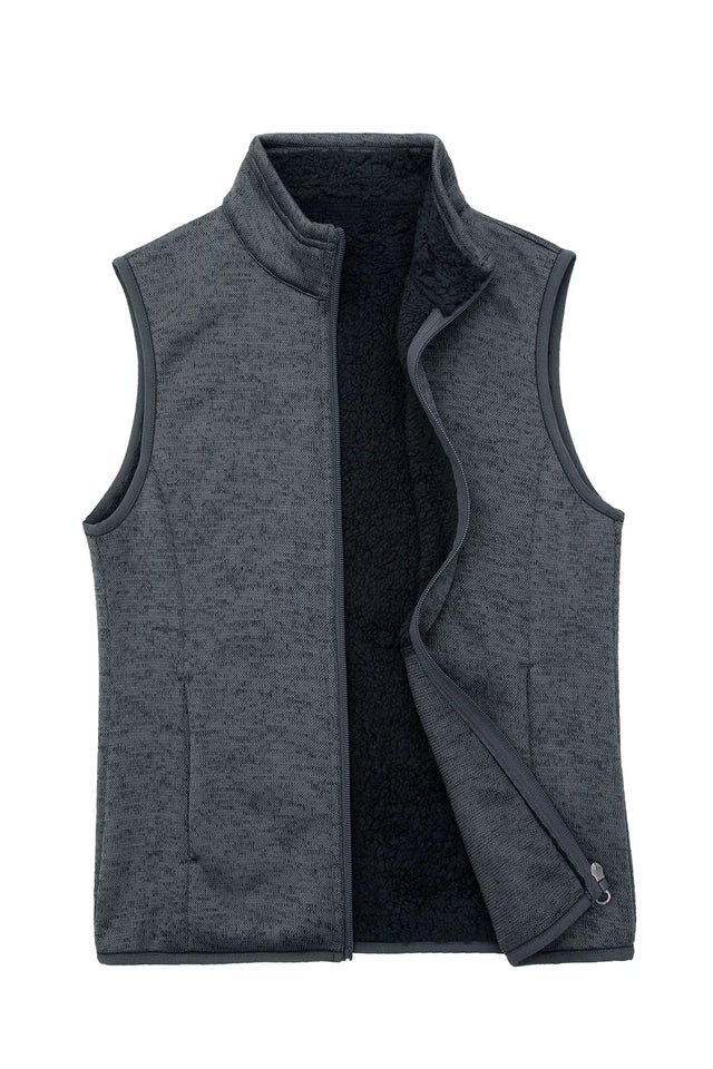 Front view of a women's dark gray sweater fleece vest with sherpa lined