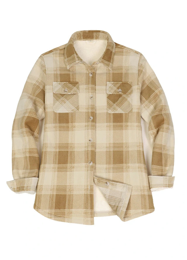 Front view of a women's yellow button up plaid shacket with sherpa lined