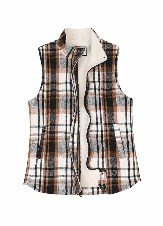 Front view of a womens black and white full zip sherpa lined plaid vest