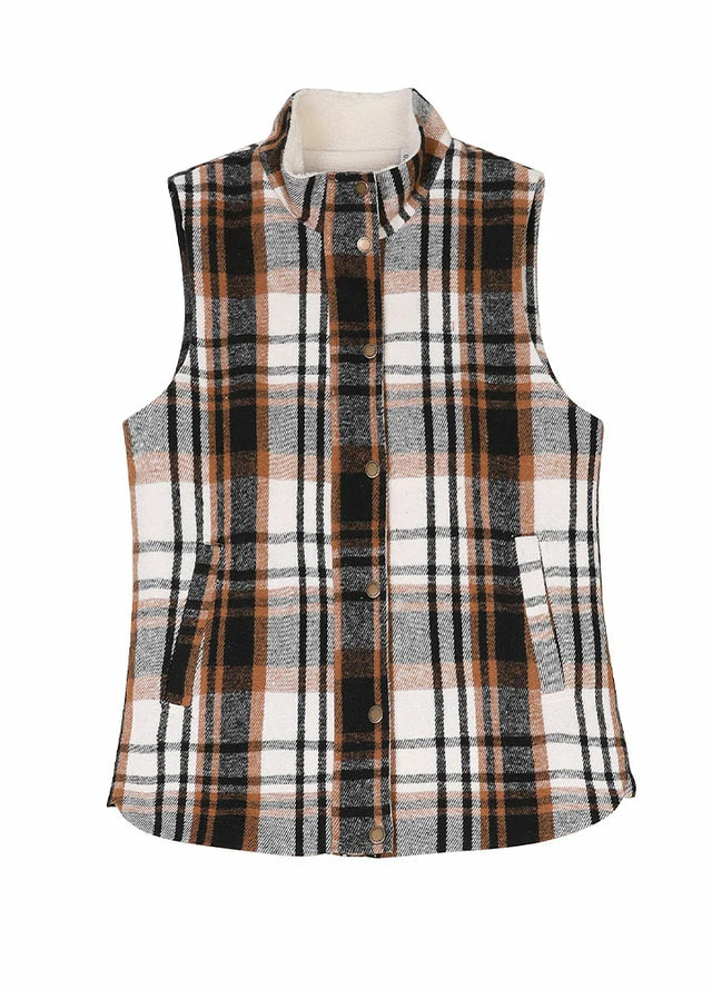 Front view of a womens black and white sherpa lined sleeveless plaid vest