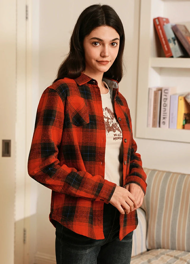 Side view of women in a dark red winter fleece lined plaid shacket