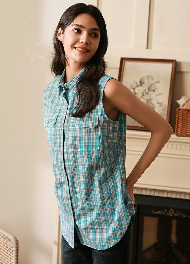 Side view of women in a lightweight sleeveless baby blue plaid vest
