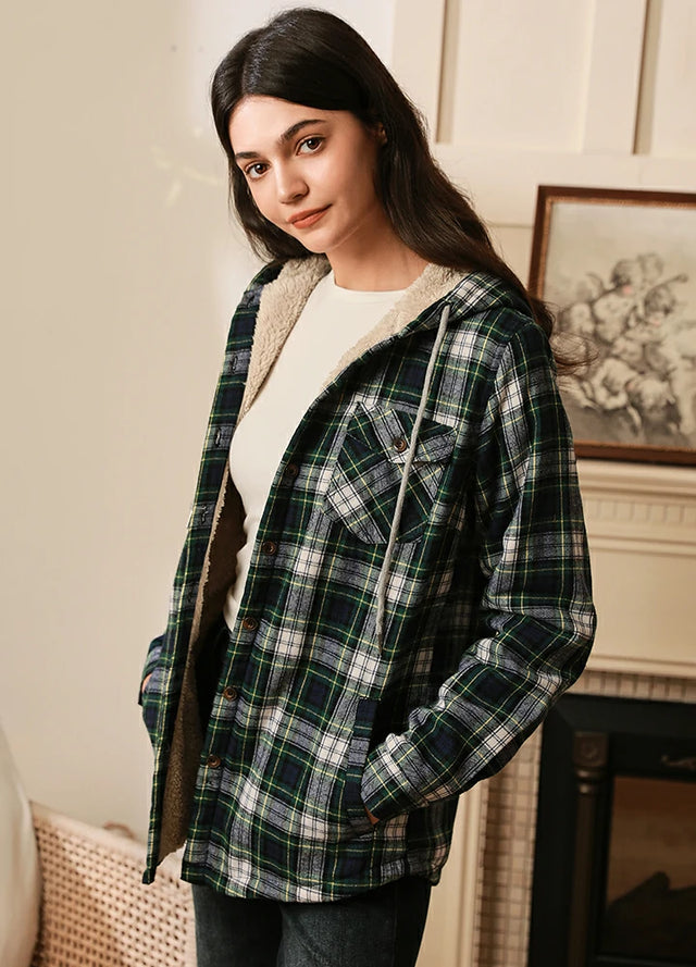 Side view of women in a plaid green sherpa lined plaid hooded