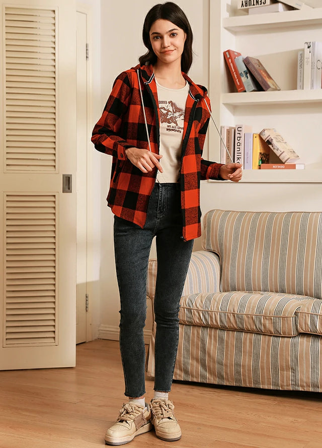 Woman in a red black heavyweight plaid flannel hooded zip-up jacket