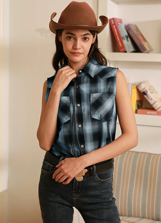 Women in a blue black summer western pearl snap plaid vest