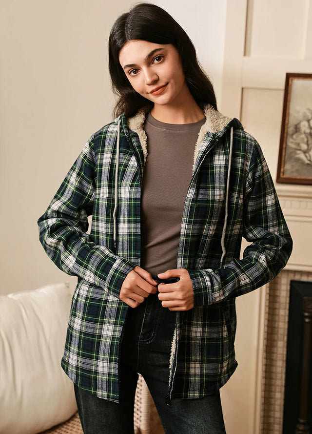 Women in a green plaid sherpa-lined flannel plaid jacket with hood