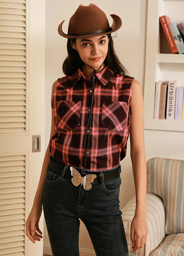 Women in a pink black summer western pearl snap plaid vest