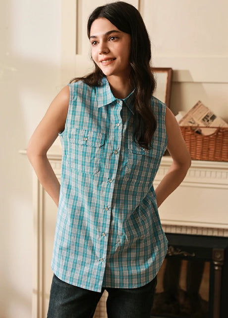Women in a baby blue cotton western pearl snap plaid vest