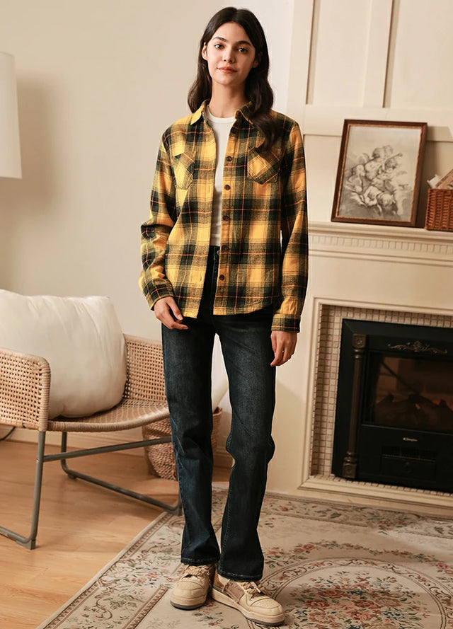 Women in a yellow fleece-lined flannel shacket with long sleeves