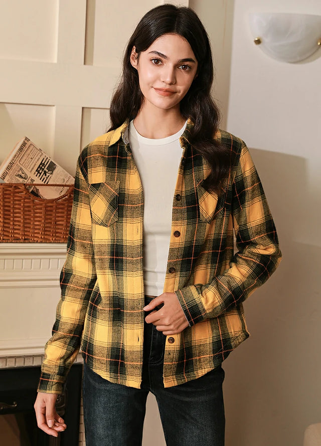 Women in a yellow fleece lined flannel plaid shirt jacket