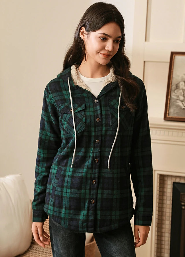 Women wearing a green and black winter plaid hoodie with sherpa lined