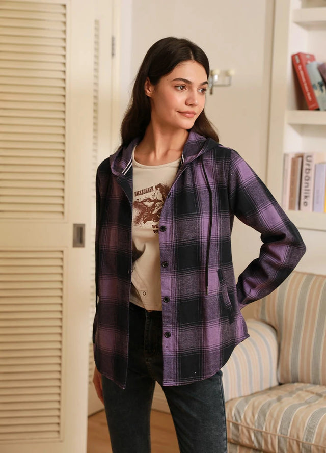 Women wearing a purple long-sleeves flannel hoodie with hand pockets