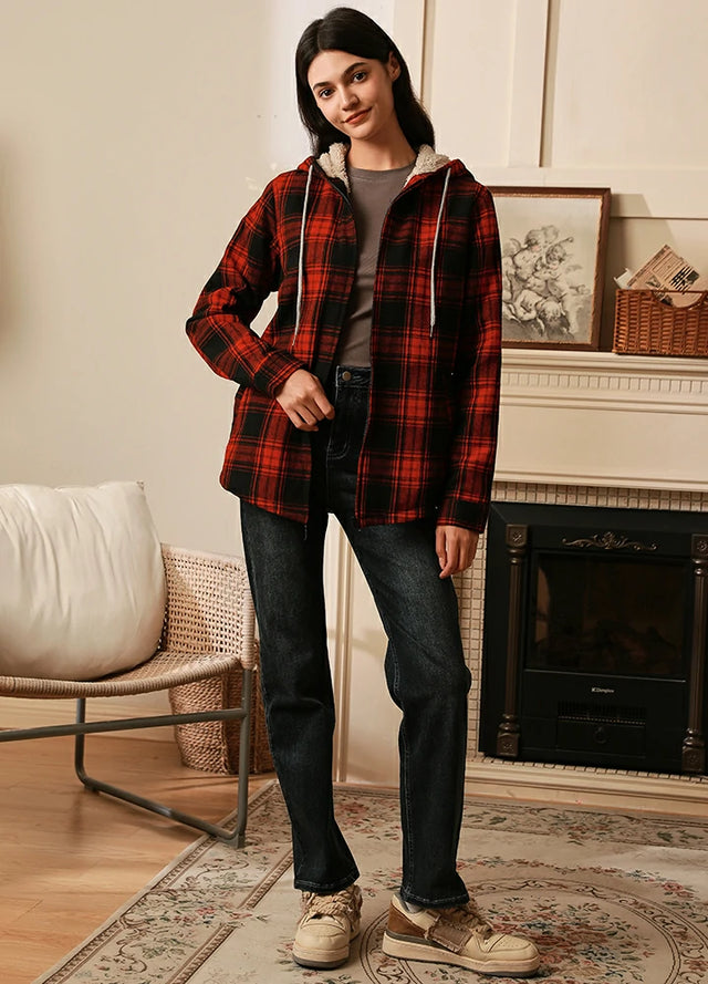 Women wearing a red black zip up sherpa lined plaid flannel hooded