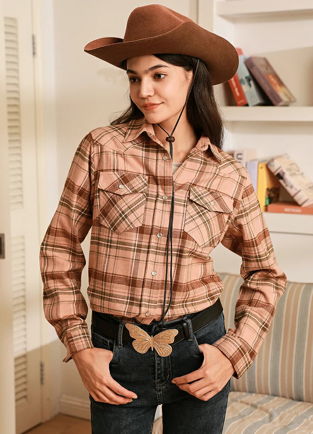 Women wearing a pink long sleeves plaid flannel shirt