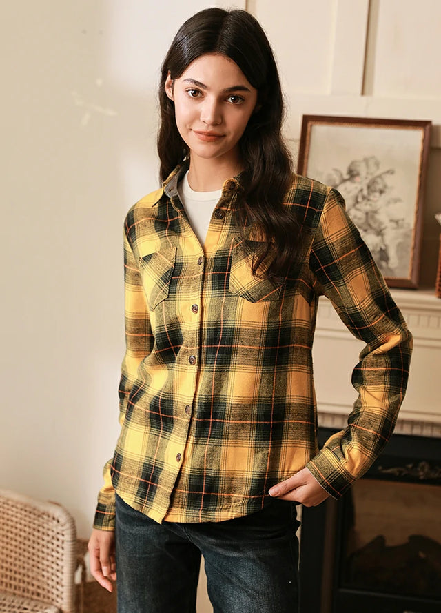 Women wearing a warm yellow flannel plaid shirt with fleece lined