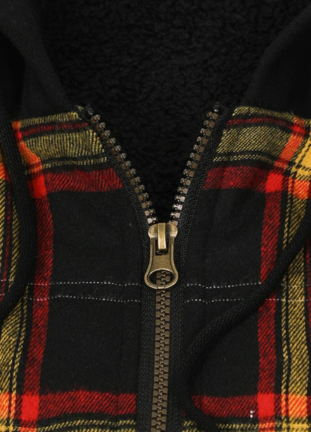 Close-up of the zipper of red and black men's insulated flannel shirt jacket with hood