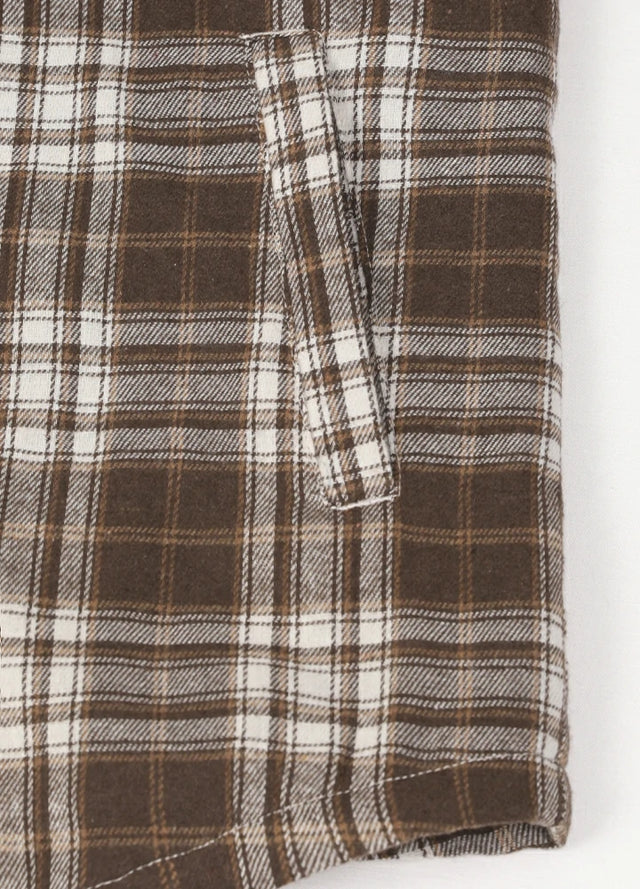Close-up of the hand pocket of coffee white men's sherpa lined hooded flannel jacket