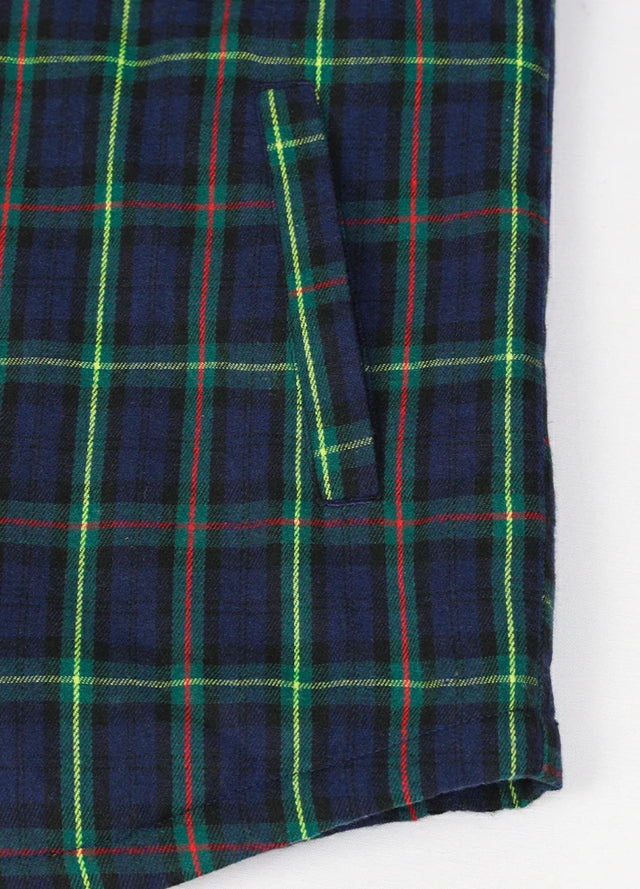 Close-up of the hand pocket of the Navy Green men's snap front plaid shirt jacket