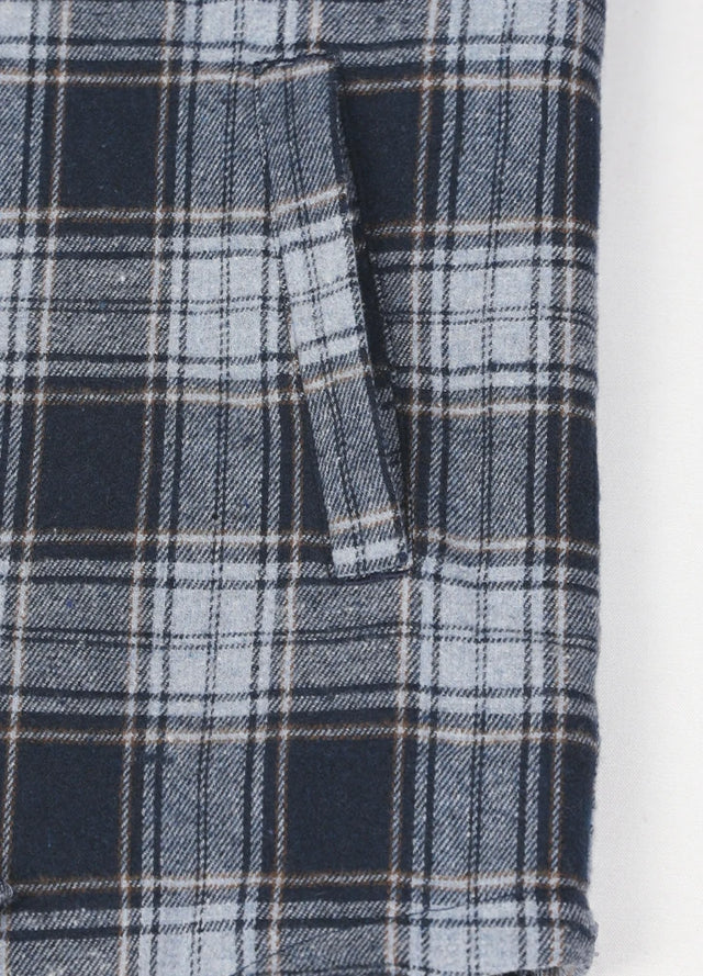 Close-up of the hand pocket of the navy white men's snap front closure plaid jacket