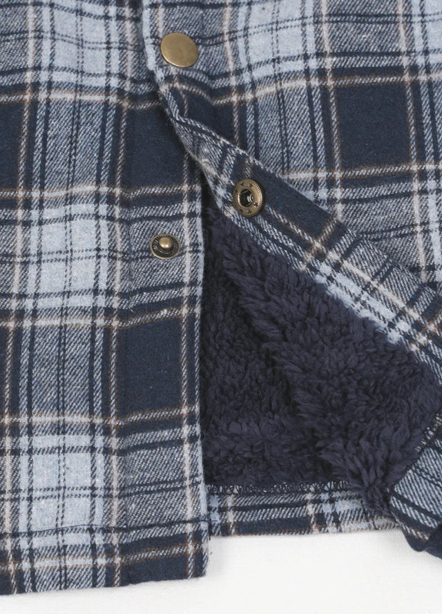 Close-up of the hem of the navy white men's snap front closure plaid jacket